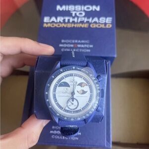 Omega x Swatch Bioceramic Moonswatch Mission To Earthphase Moonshine Snoopy